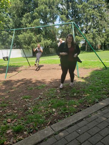 Lori at the park with the girls
